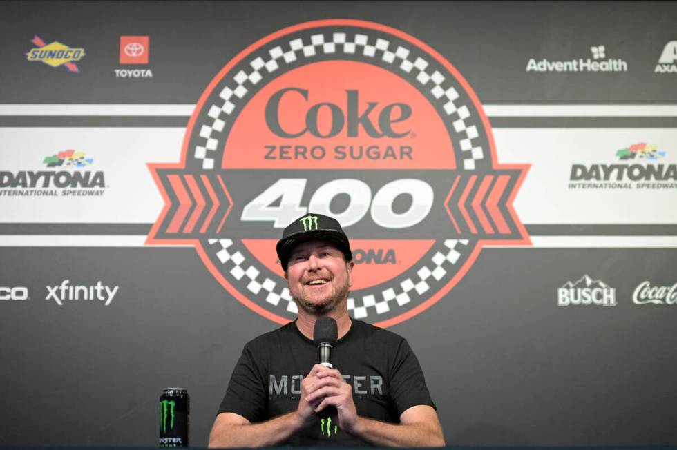 Kurt Busch answers questions from reporters after announcing his retirement before a NASCAR Cup ...