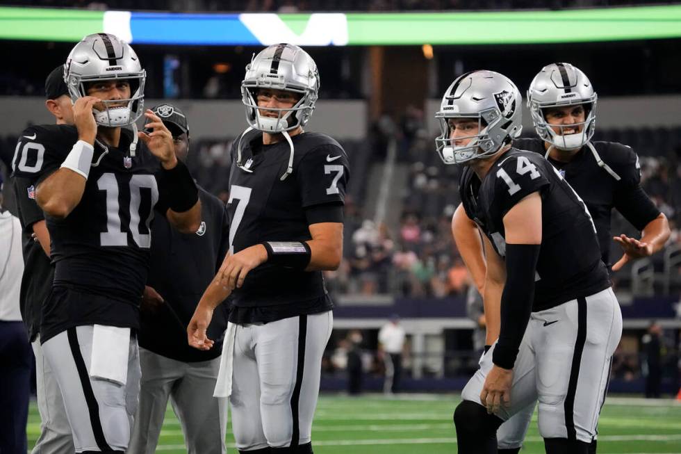 Las Vegas Raiders quarterbacks Jimmy Garoppolo (10), Brian Hoyer (7), Chase Garbers (14), and A ...