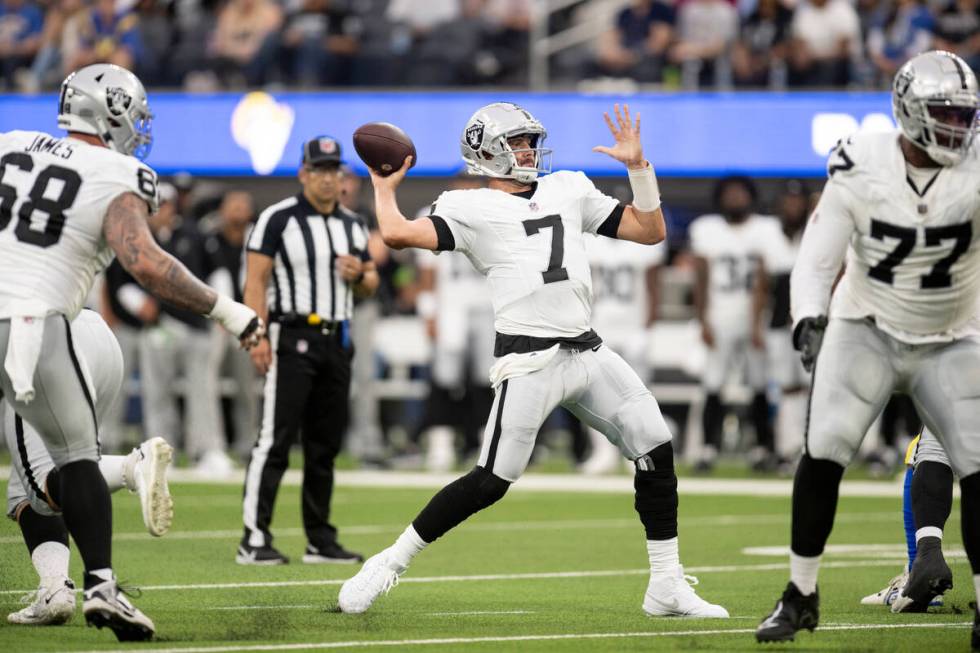 Las Vegas Raiders quarterback Brian Hoyer (7) throws a pass during an NFL preseason football ga ...