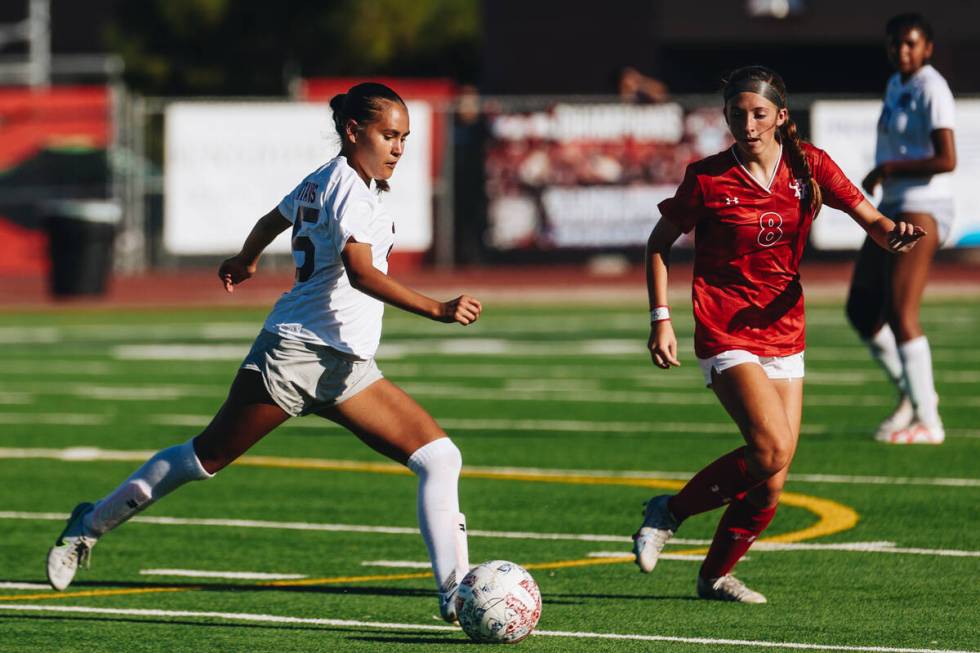 Arbor View player Bailee Little (8) follows the ball as Cimarron-Memorial midfielder Woniya San ...