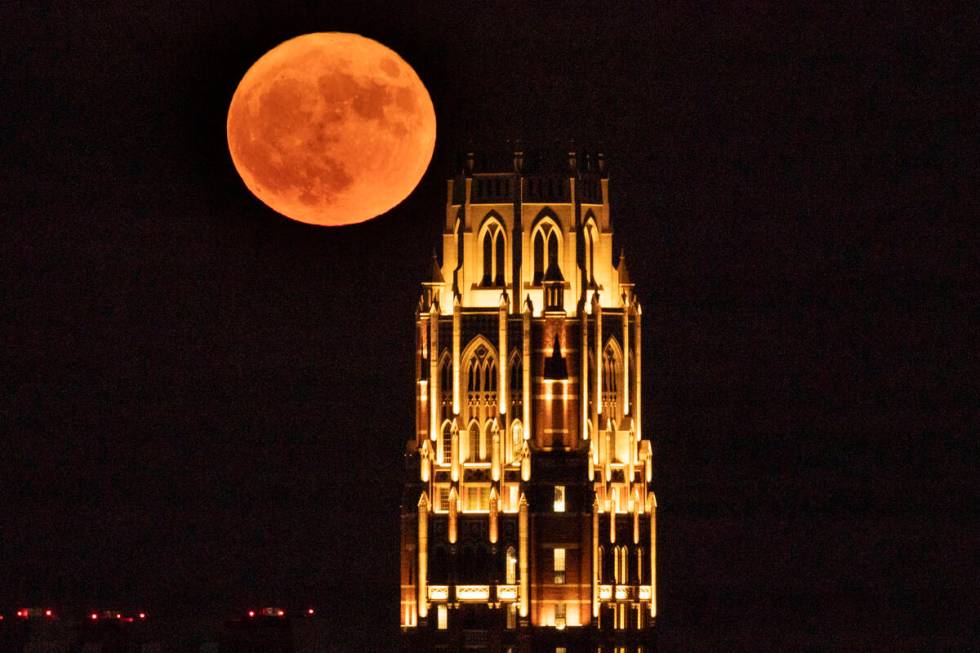 FILE - A supermoon rises over the West End Tower at Vanderbilt University, Aug. 1, 2023, in Nas ...