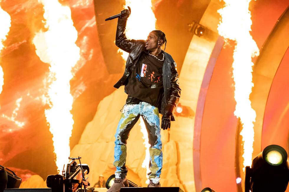 FILE - Travis Scott performs at the Astroworld Music Festival in Houston, Nov. 5, 2021. (Photo ...