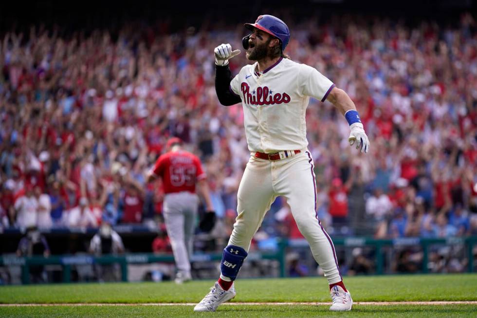 Philadelphia Phillies' Bryce Harper reacts after hitting a two-run home run against Los Angeles ...