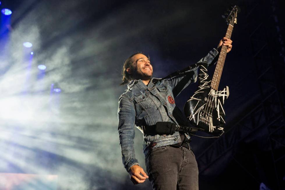 Pete Wentz, of Fall Out Boy, performs at Wrigley Field in Chicago, Saturday, Sept. 8, 2018. (As ...