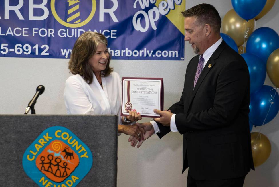 FILE - Jack Martin, director of Clark County Juvenile Justice Services, receives a certificate ...