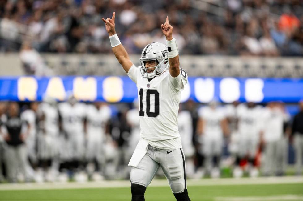 Las Vegas Raiders quarterback Jimmy Garoppolo (10) reacts on the team's touchdown during an NFL ...