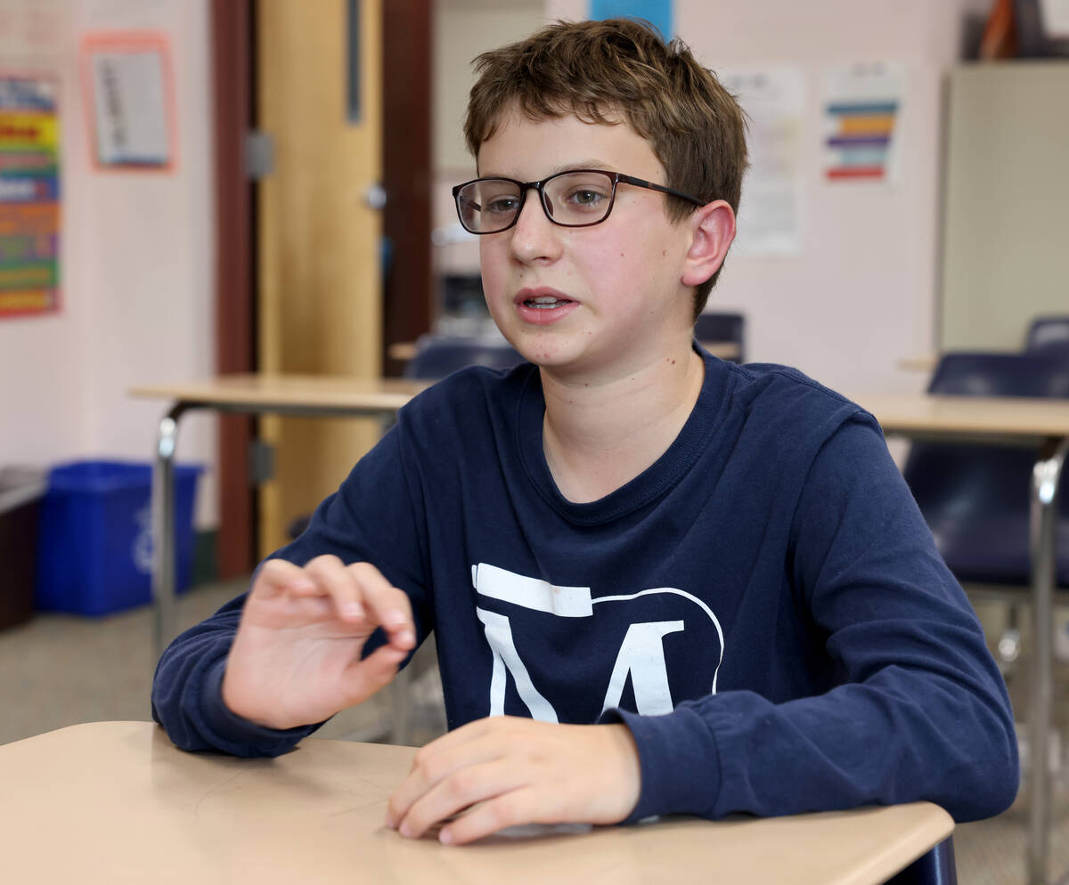 Seventh grader Elliot Lefebvre talks to a reporter at The Meadows School in Las Vegas Friday, A ...