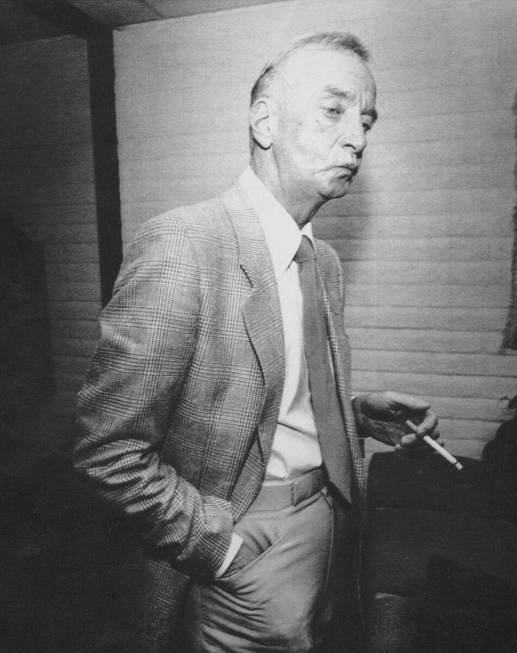 Las Vegas casino operator Frank "Lefty" Rosenthal smokes a cigarette after a hearing before the ...