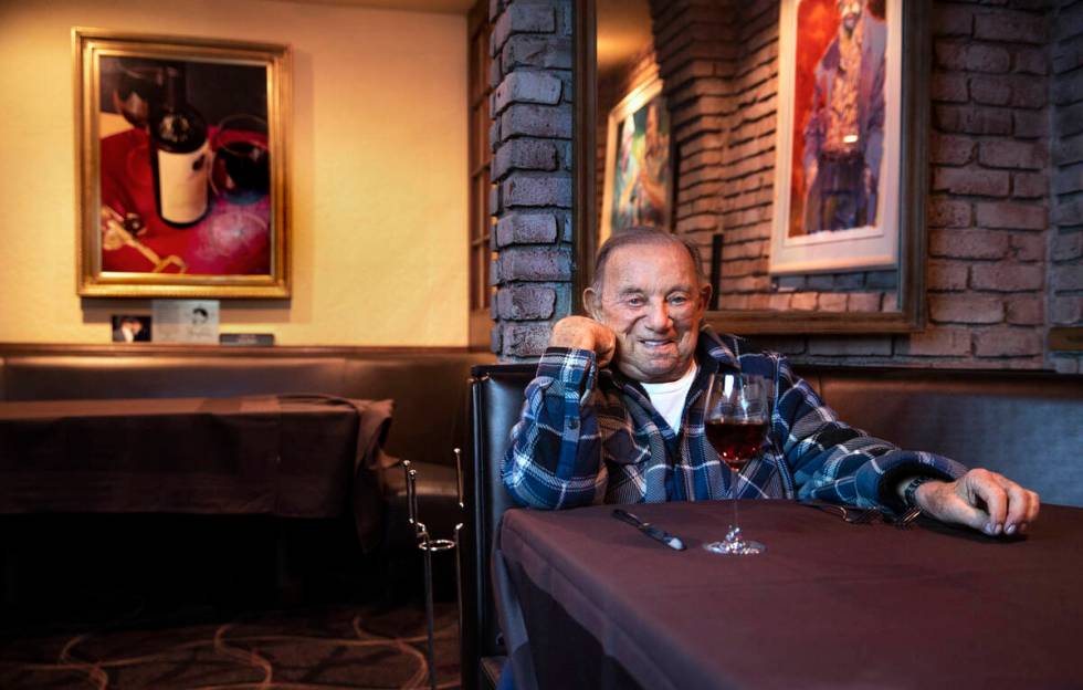 Piero's owner Freddie Glusman at the booth in his restaurant which featured a scene with Robert ...