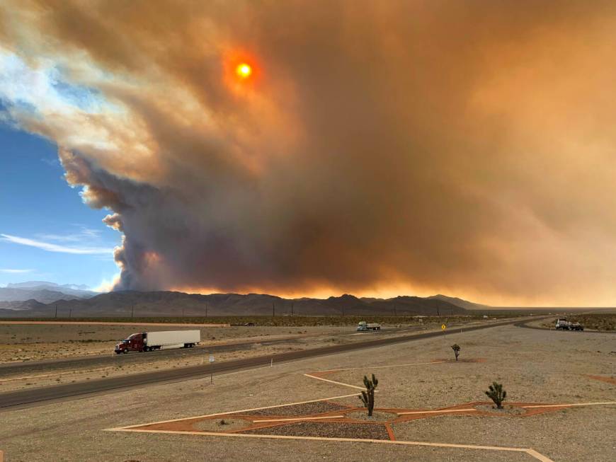 Smoke is seen from the Snow Mountain overpass and U.S. Highway 95 North on Sunday, June 28, 202 ...