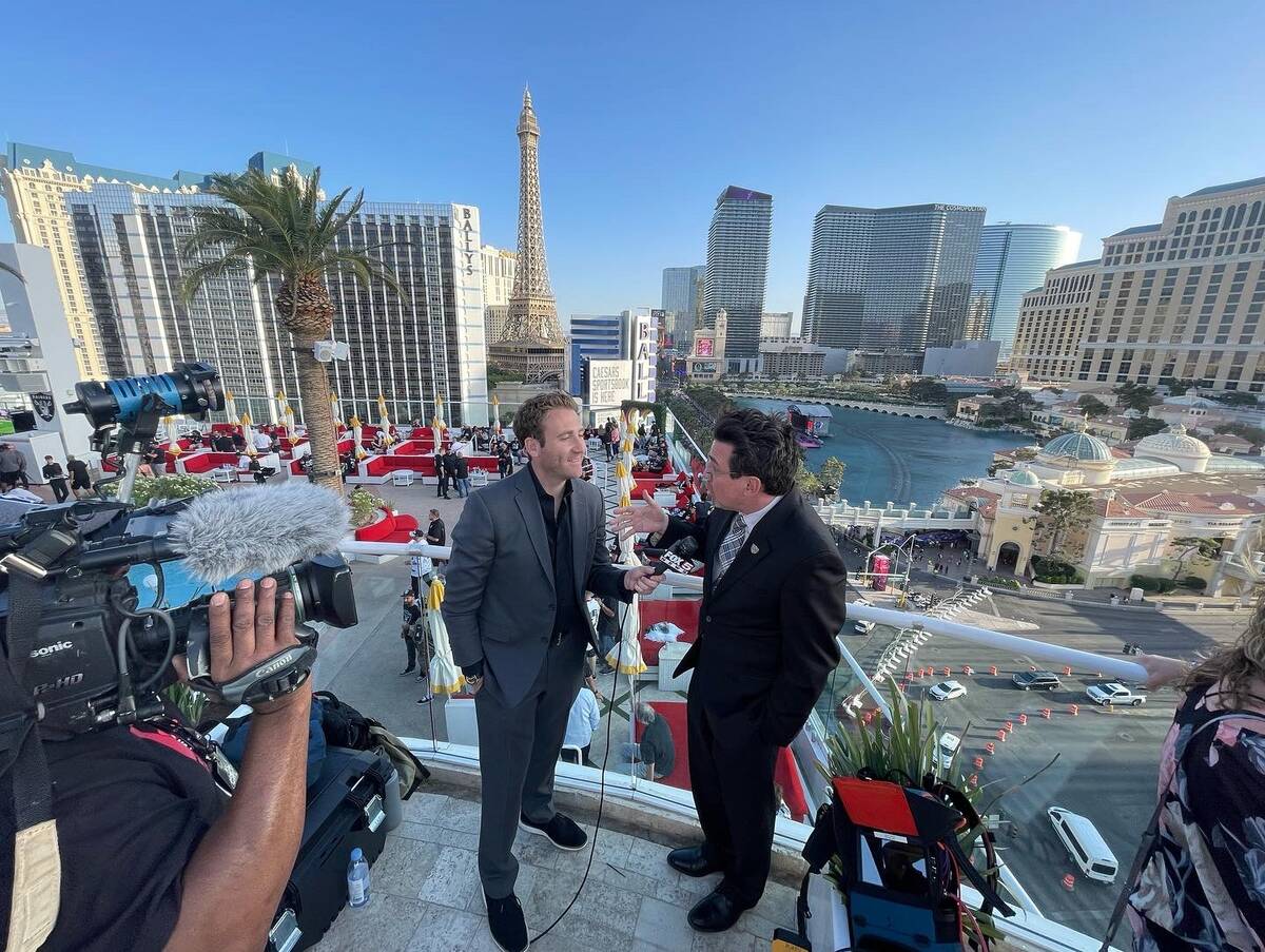 Mike Davis shown interviewing Applied Analysis principal analyst Jeremy Arguero at Drai's at th ...