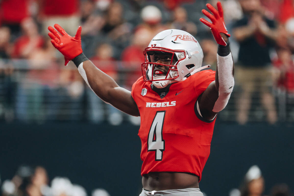 UNLV running back Donavyn Lester (4) celebrates a touchdown during a game against Bryant at All ...