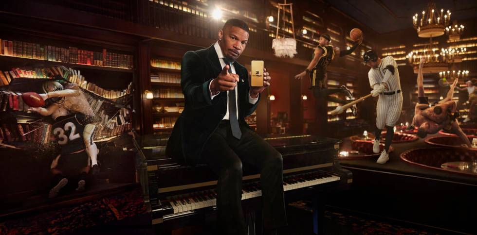 A-list actor Jaime Foxx is shown at NoMad Library at NoMad Hotel in the Bet MGM betting app's " ...