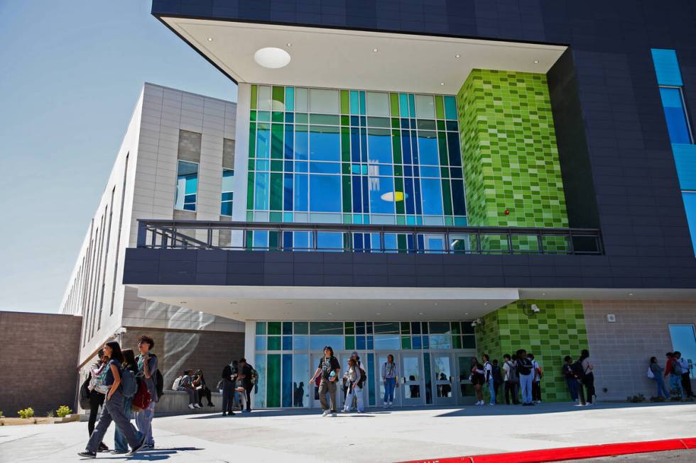 Northeast Career and Technical Academy students walk out of their new campus on Dorrell Lane in ...