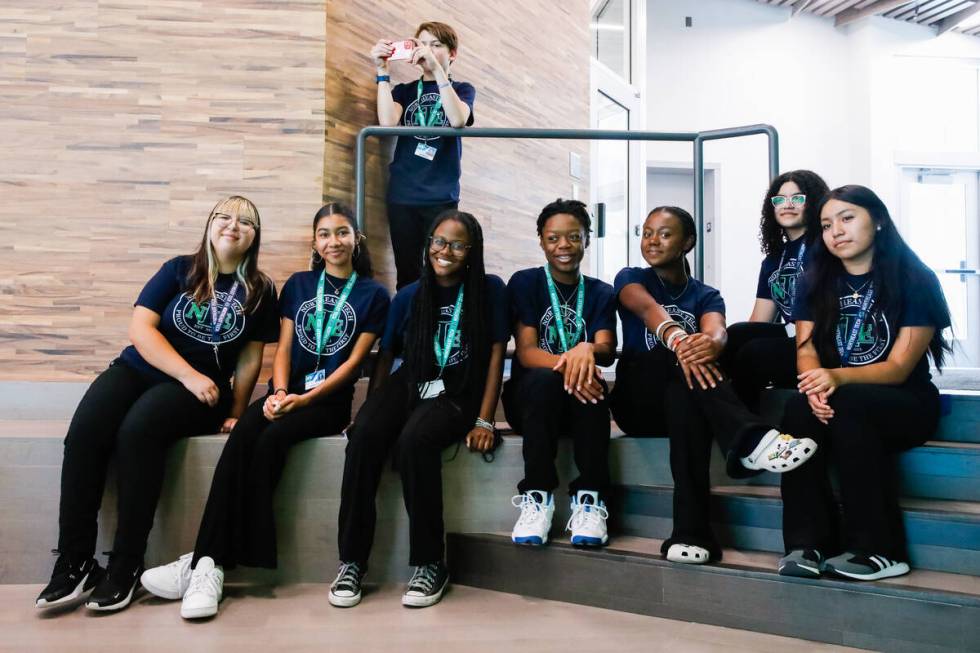 Northeast Career and Technical Academy student ambassadors watch the the ribbon cutting ceremon ...