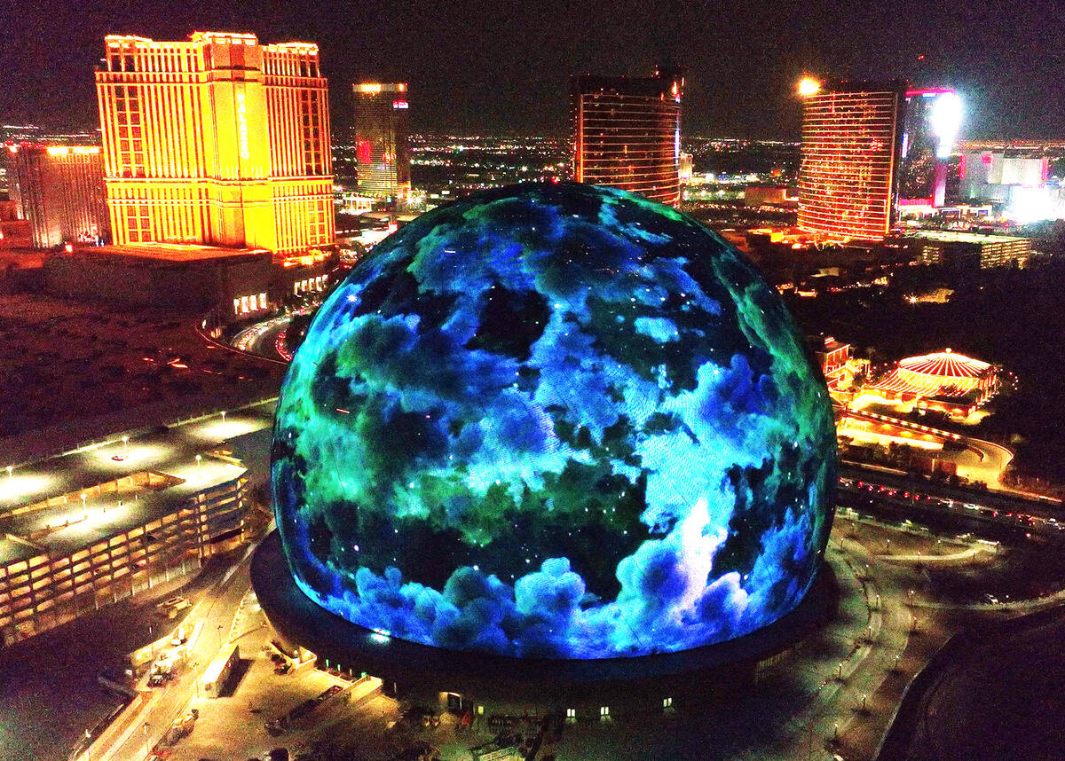 The MSG Sphere illuminates the Las Vegas skyline, on Monday, July 31, 2023, in Las Vegas. (Bizu ...