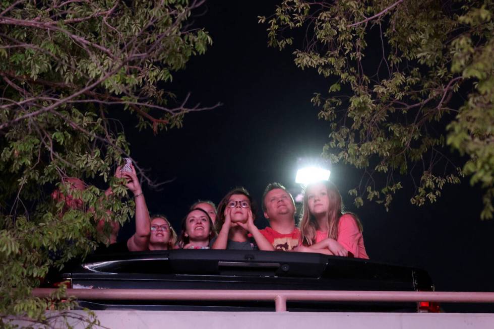 The Sphere lights up people on Manhattan Street near the Strip in Las Vegas Wednesday, Aug. 16, ...