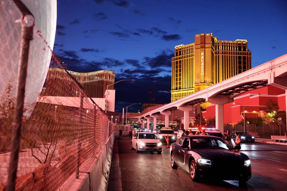 The Sphere lights up people on Sands Avenue near the Strip in Las Vegas Wednesday, Aug. 16, 202 ...