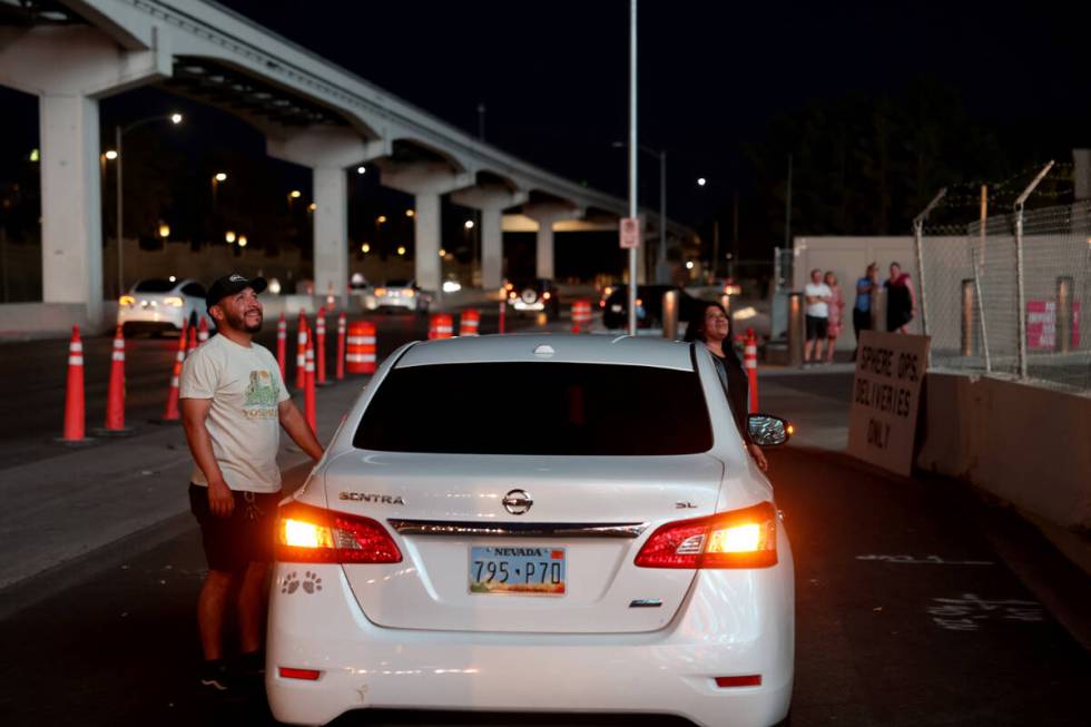 The Sphere lights up people on Sands Avenue near the Strip in Las Vegas Wednesday, Aug. 16, 202 ...