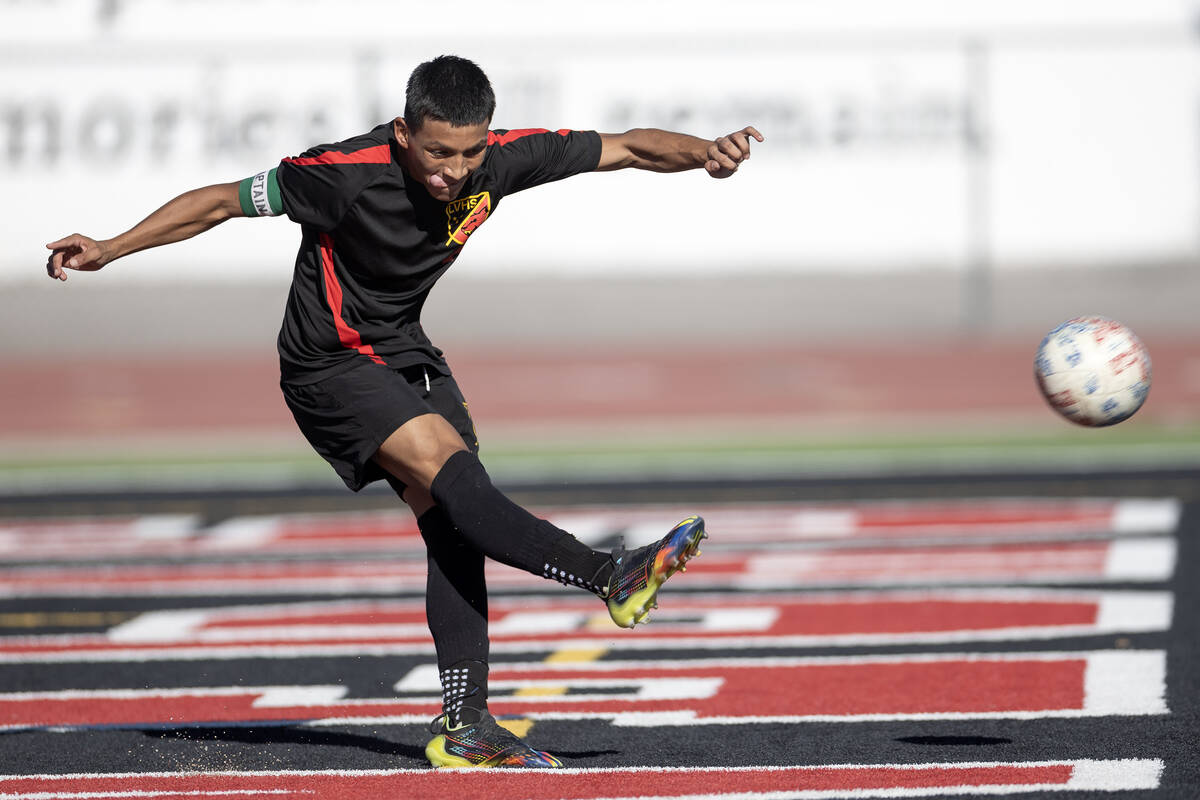 Las Vegas' Ariel Lopez Trujillo (3) kicks the ball into play during a boys high school soccer g ...