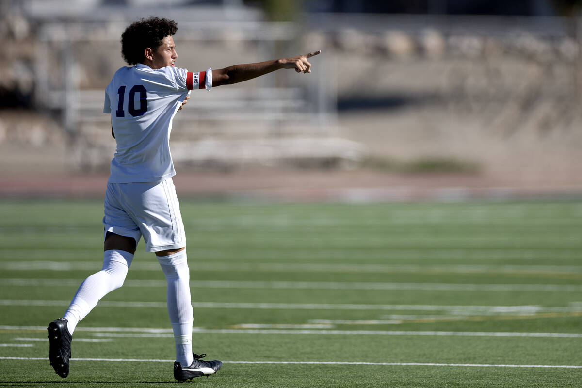 Sunrise Mountain's Michael Umana (10) gestures to the stands after scoring a goal during a boys ...