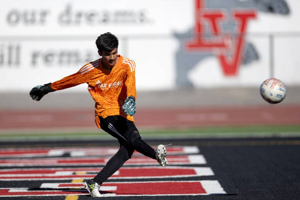 Las Vegas' goalkeeper Byron Medina kicks the ball into play during a boys high school soccer ga ...