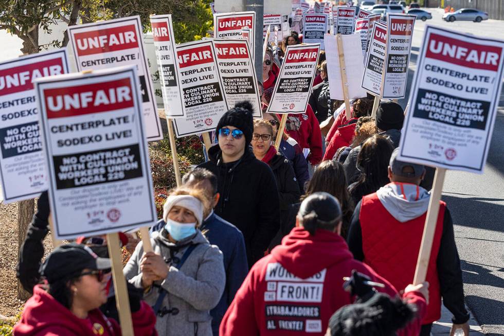 Culinary Union workers picket in front of the Las Vegas Convention Center, on Thursday, Feb.16, ...