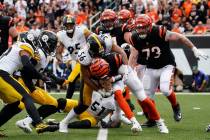 Pittsburgh Steelers linebacker Alex Highsmith (56) sacks Cincinnati Bengals quarterback Joe Bur ...