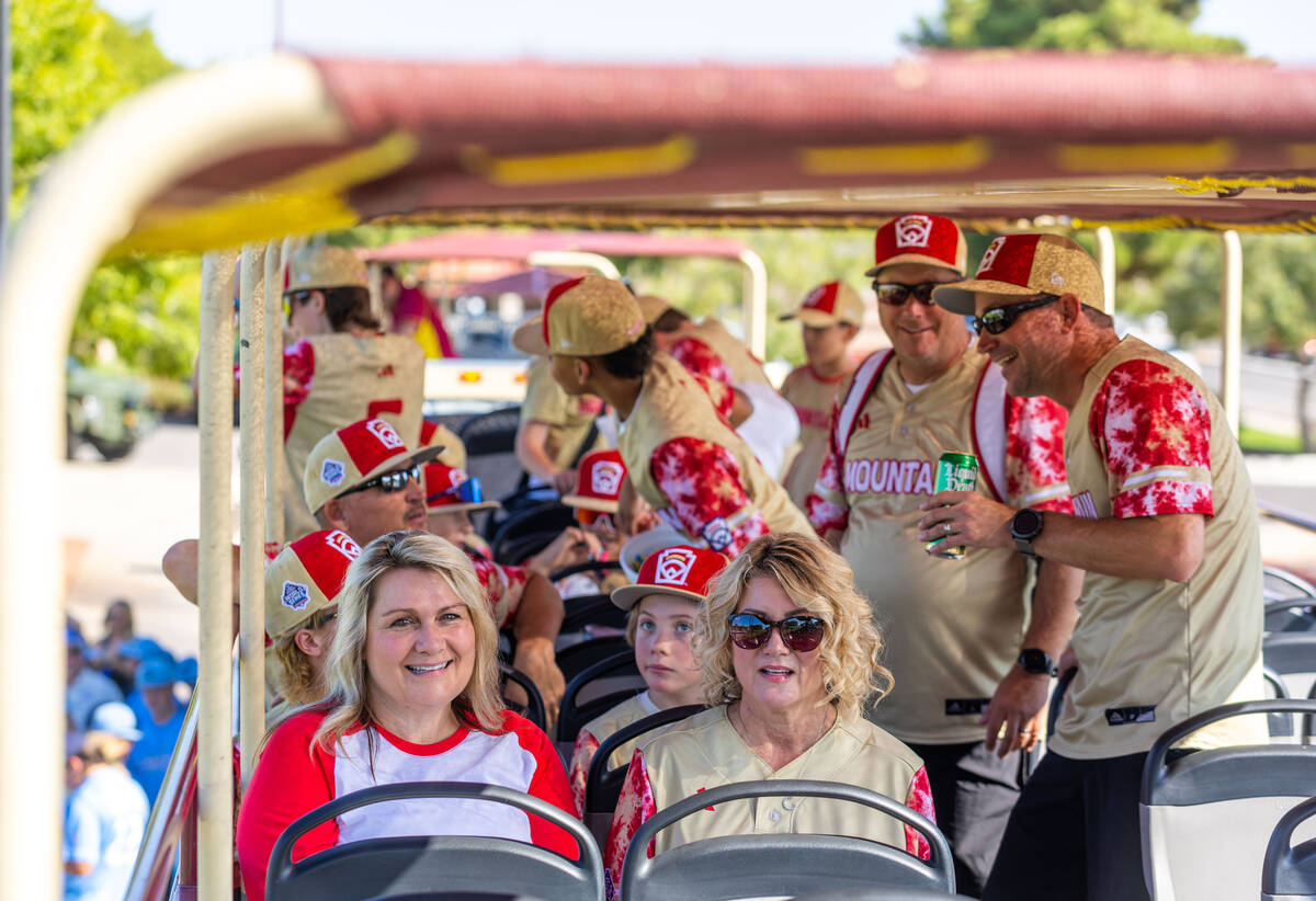 Councilwoman Carrie Cox, bottom left, and Mayor Michelle Romero, join the Henderson Little Leag ...