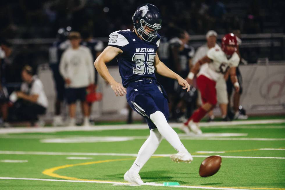 Shadow Ridge kicker Ryan Murphy (35) kicks the ball during a game against Arbor View at Shadow ...