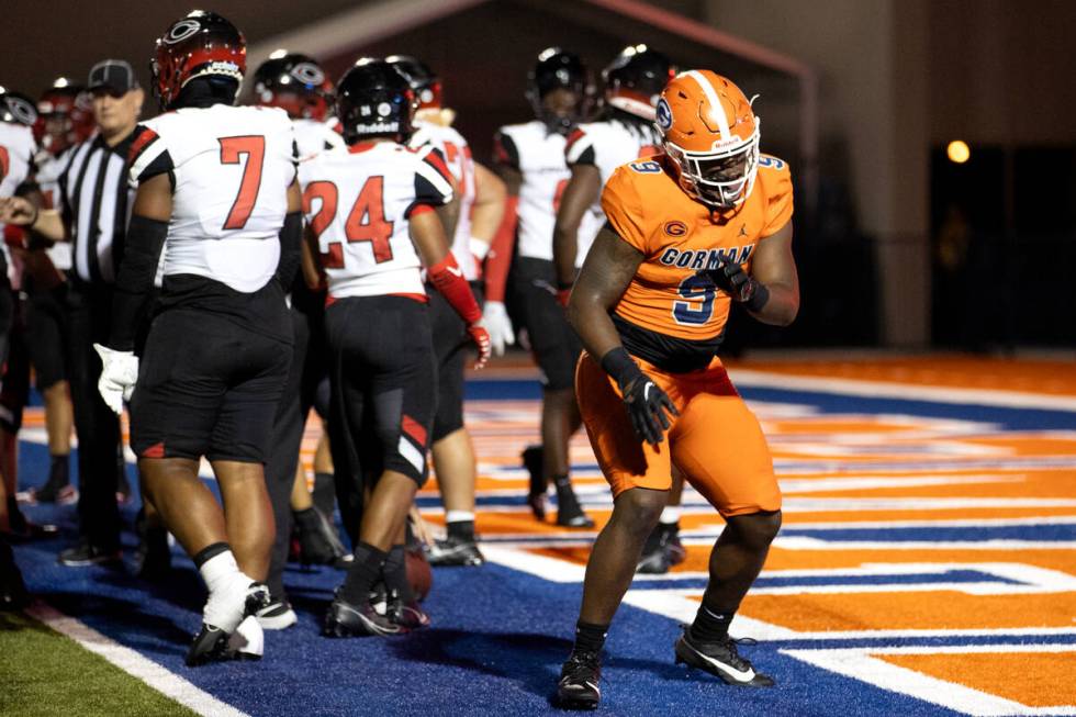 Bishop Gorman’s Elija Lofton (9) dances after scoring a touchdown over Centennial during ...