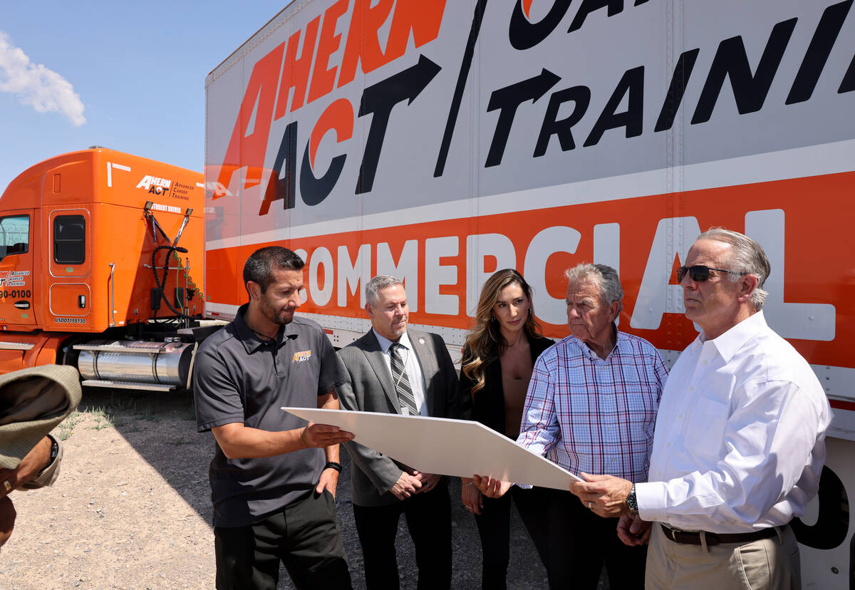 Gov. Joe Lombardo, right, tours the under construction Vocational Village site at Southern Dese ...