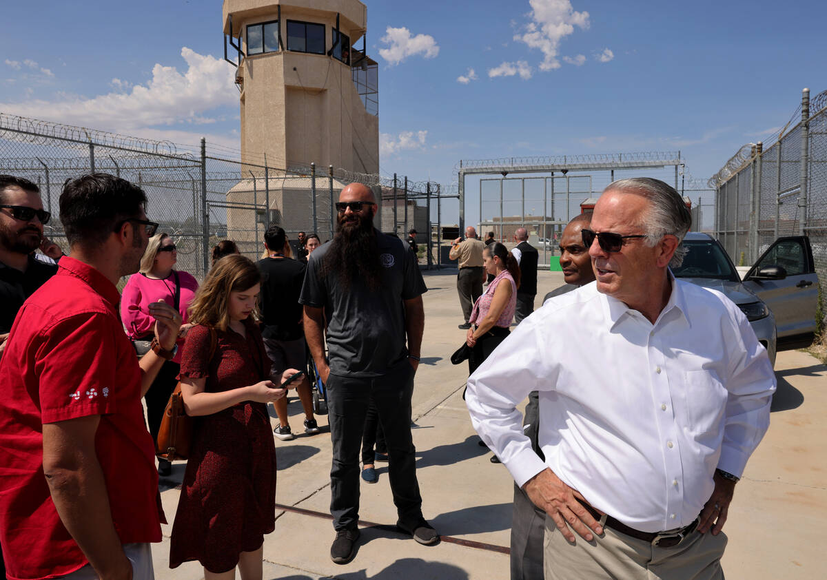 Gov. Joe Lombardo, right, tours the under construction Vocational Village site at Southern Dese ...