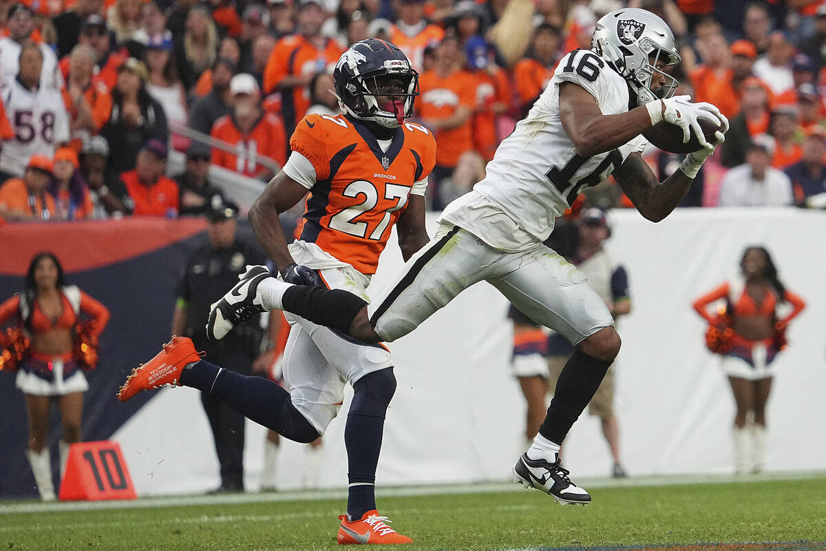 Las Vegas Raiders wide receiver Jakobi Meyers (16) catches the ball against the Denver Broncos ...