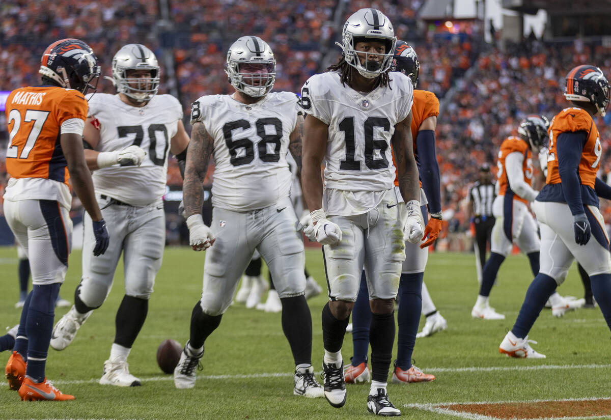 Raiders wide receiver Jakobi Meyers (16) celebrates his second touchdown score of the day durin ...