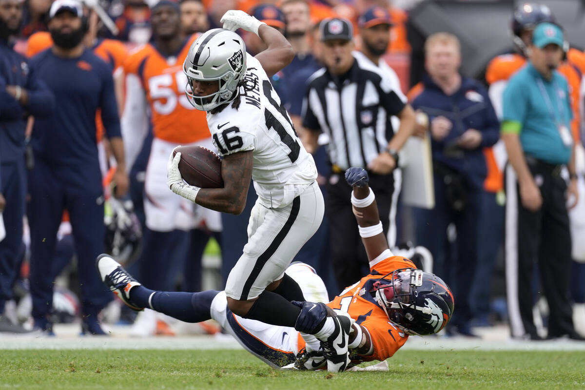 Las Vegas Raiders wide receiver Jakobi Meyers (16) breaks away from Denver Broncos cornerback D ...