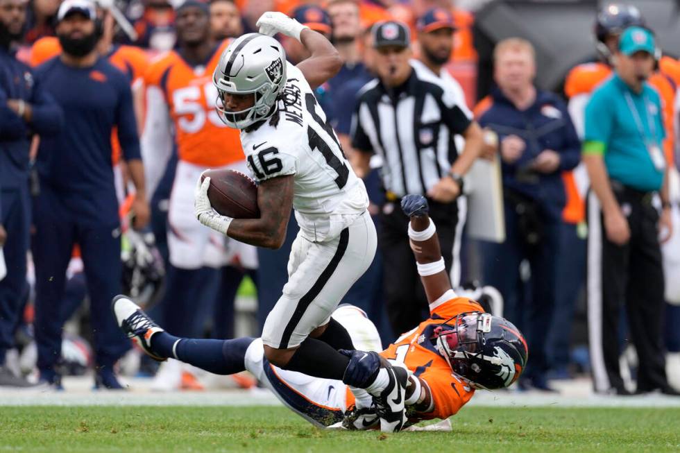 Las Vegas Raiders wide receiver Jakobi Meyers (16) breaks away from Denver Broncos cornerback D ...