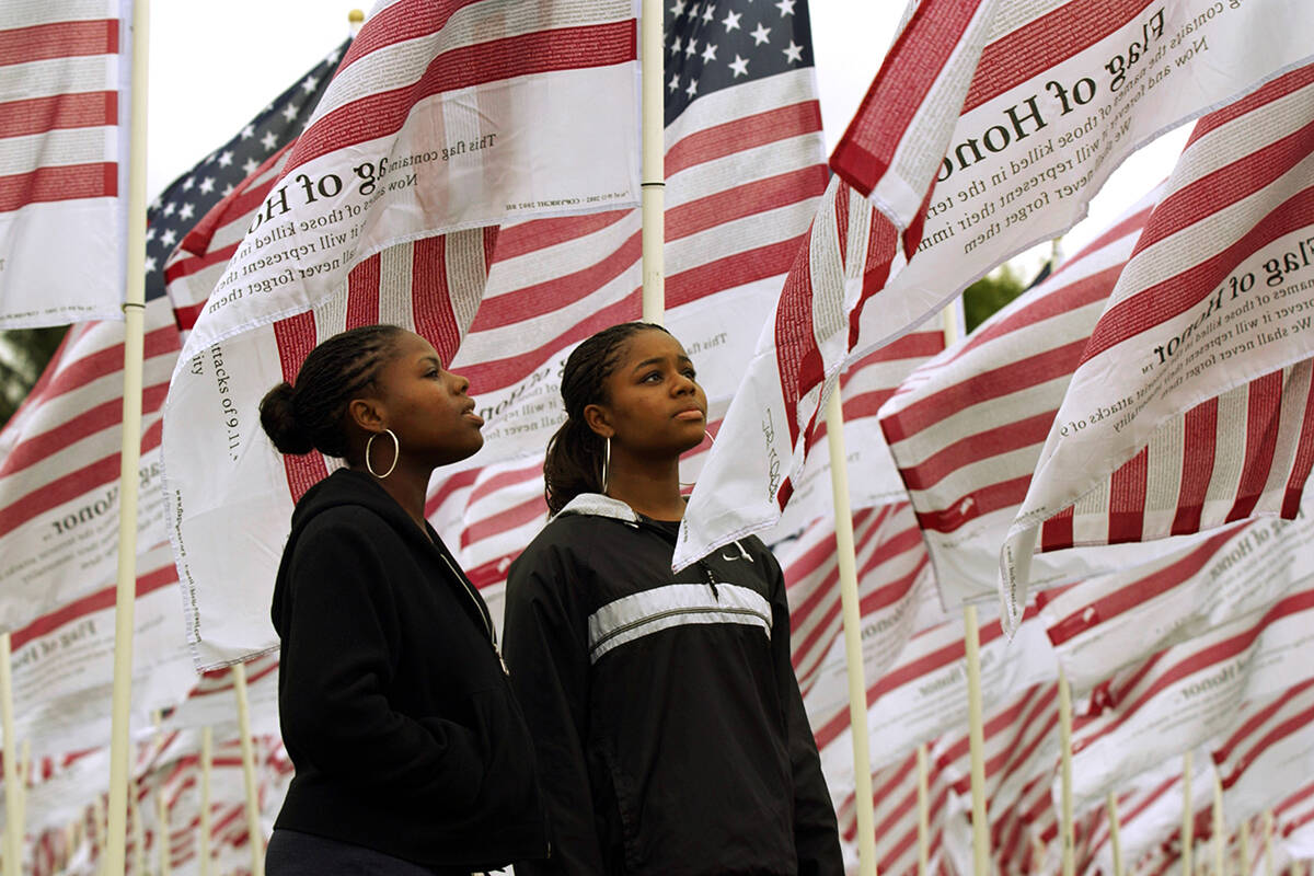 FILE — Identical twins Janita Ollison, left ,and Jeannetta Ollison 17, of Gresham Oregon ...