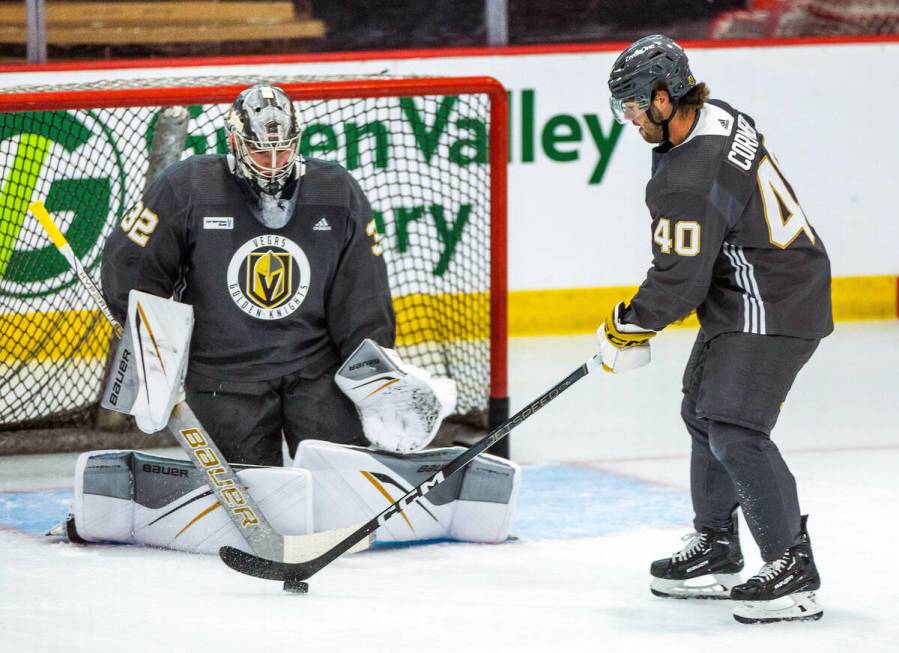 Golden Knights rookie defenseman Lukas Cormier (40) sets up a shot attempt on goalie Jesper Vik ...