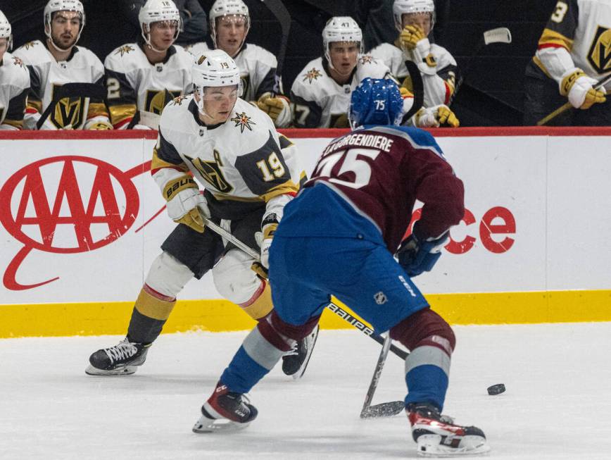 Golden Knights prospect forward Brendan Brisson (19) skates with the puck past Colorado Avalanc ...