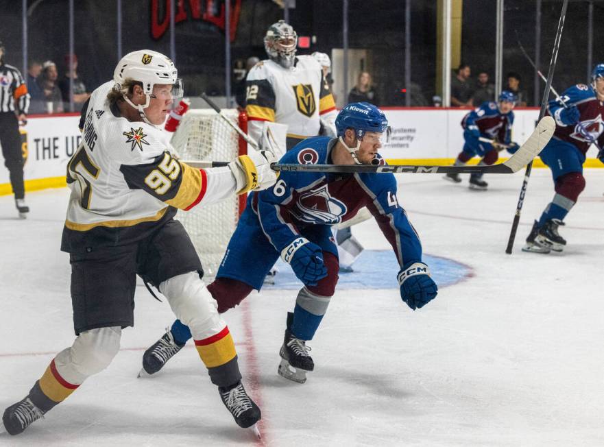 Colorado Avalanche Ryan Sandelin (46) looses his hockey stick as he tries to block the puck hit ...