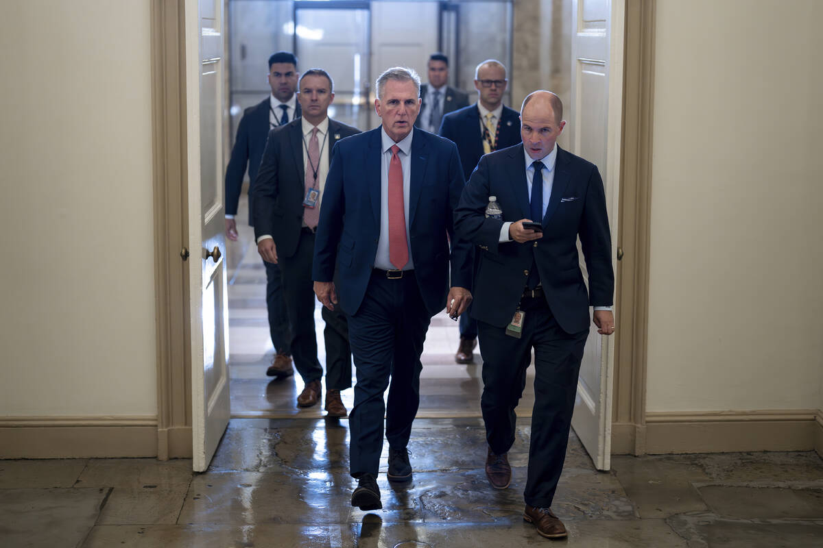 Speaker of the House Kevin McCarthy, R-Calif., arrives at the Capitol in Washington, early Tues ...