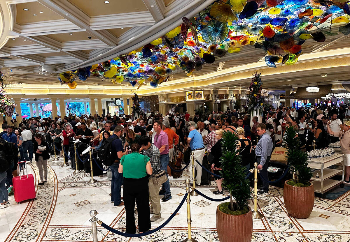 Long lines at the Bellagio front desk as guests wait to check-in on Tuesday, Sept. 12, 2023. (S ...