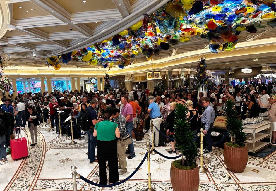 Long lines at the Bellagio front desk as guests wait to check-in on Tuesday, Sept. 12, 2023. (S ...