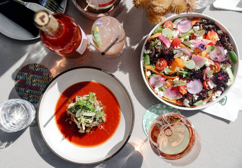 Seared Black Bass, left, and The Fine Salad, right, at Fine Company by Chef Roy Ellamar in Down ...