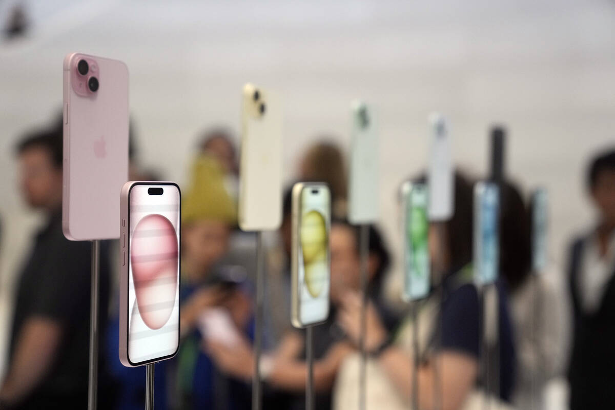 iPhone 15 and 15 Plus models are displayed during an announcement of new products on the Apple ...