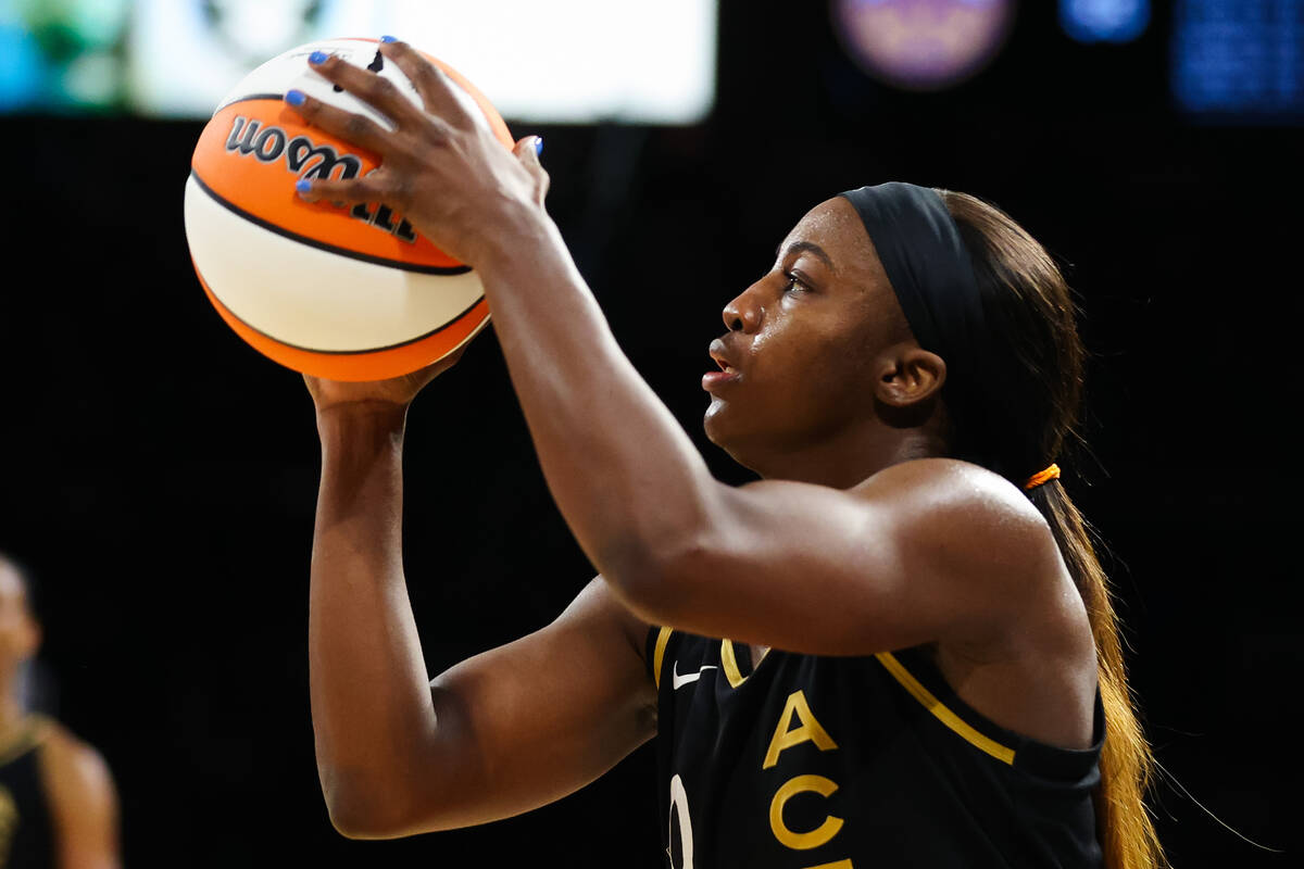 Las Vegas Aces guard Jackie Young (0) shoots a three pointer during a WNBA game against the Los ...