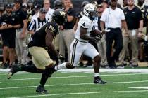 Vanderbilt running back Patrick Smith (4) runs against Wake Forest during the second half of an ...