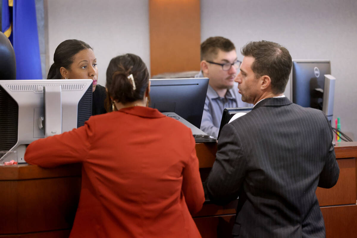 District Judge Jasmin Lily-Spells meets with Chief Deputy District Attorney Parker Brooks and L ...