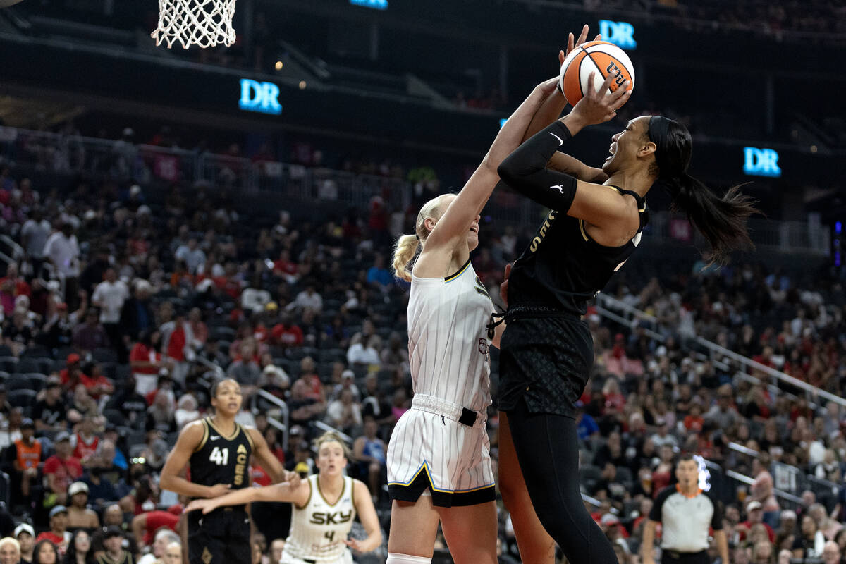 Las Vegas Aces forward A'ja Wilson (22) shoots against Chicago Sky forward Alanna Smith (8) dur ...